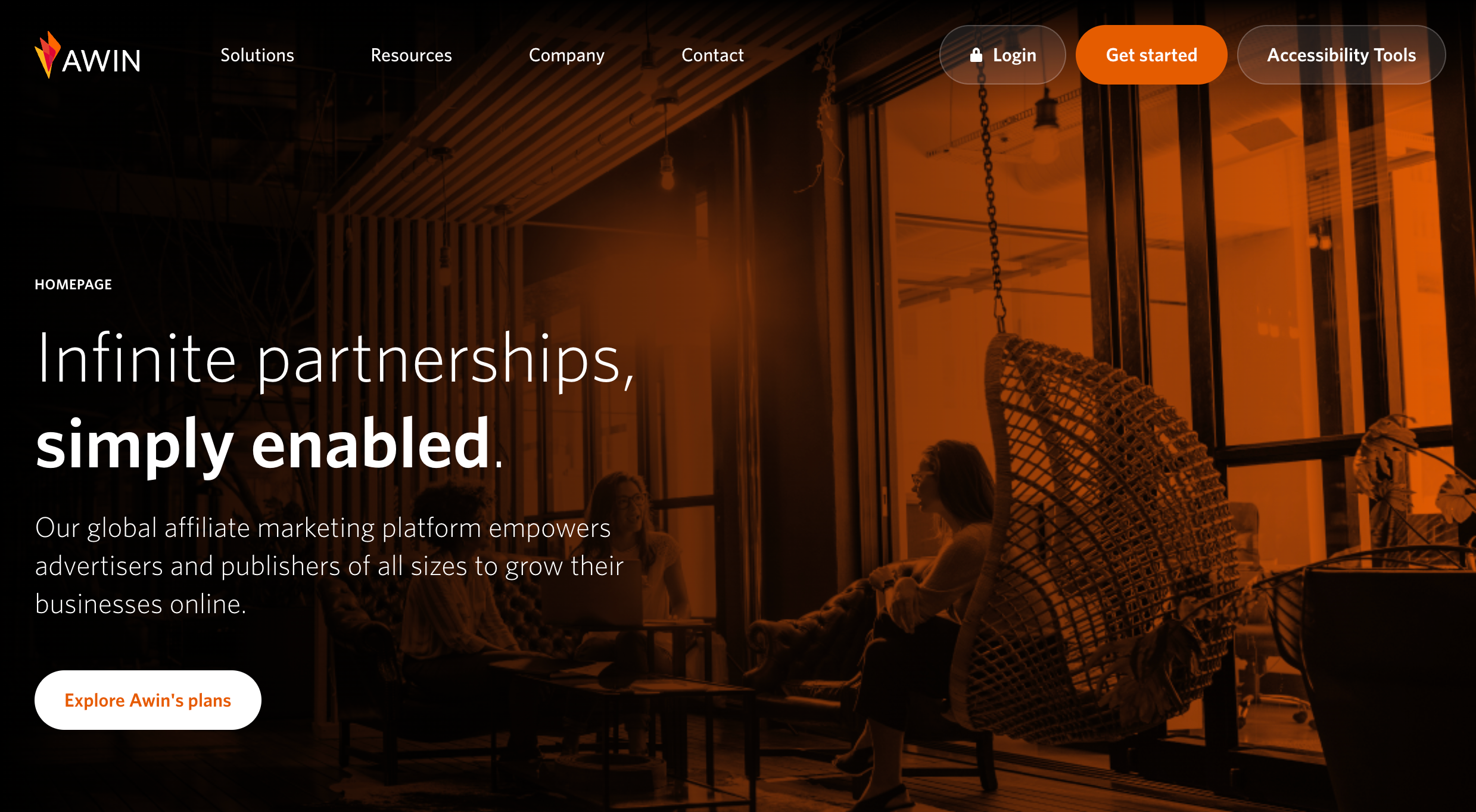 AWIN affiliate network page with red image of coworkers sitting together.